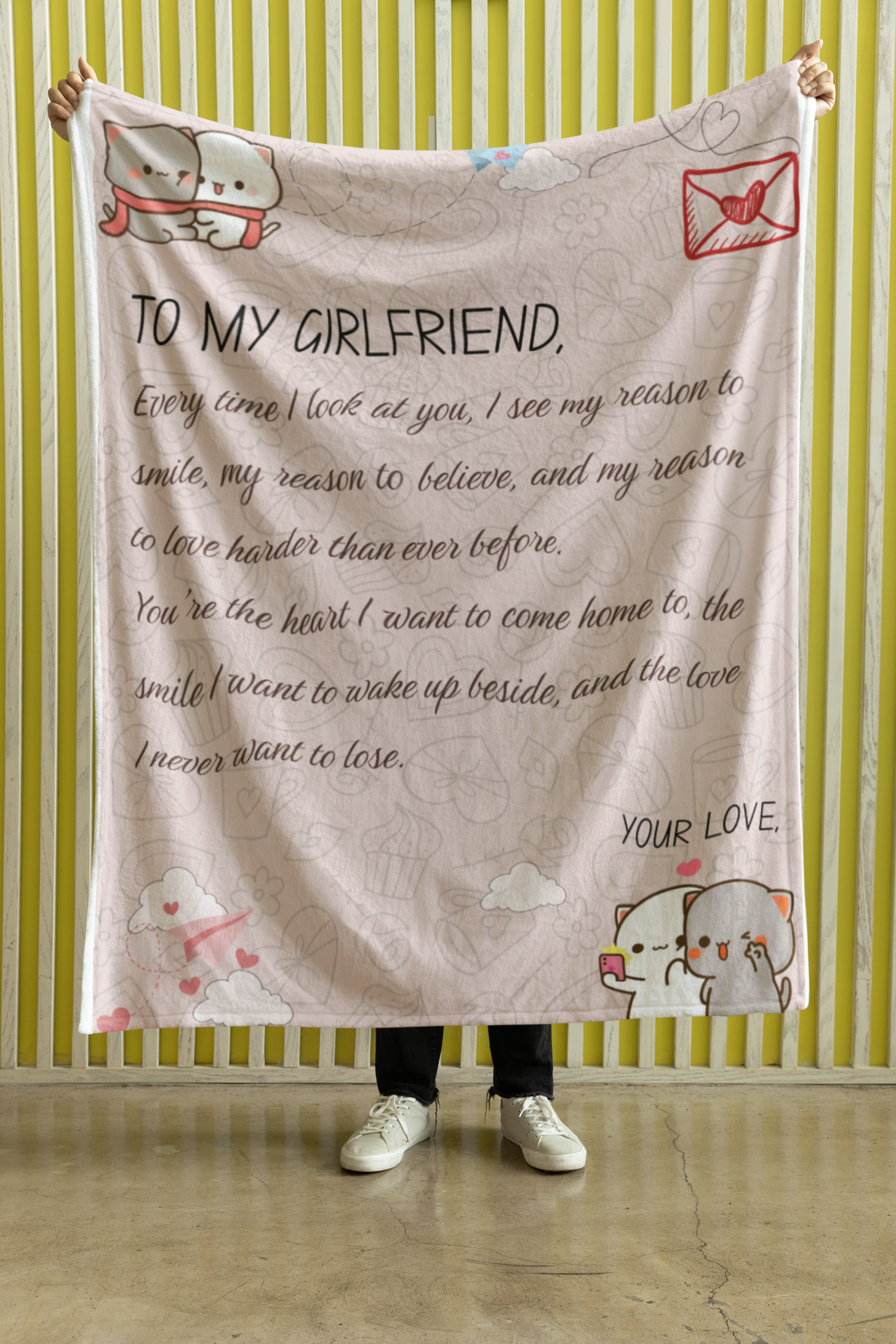 mockup-of-a-person-holding-a-velveteen-plush-fleece-blanket-against-a-yellow-wall-m35704