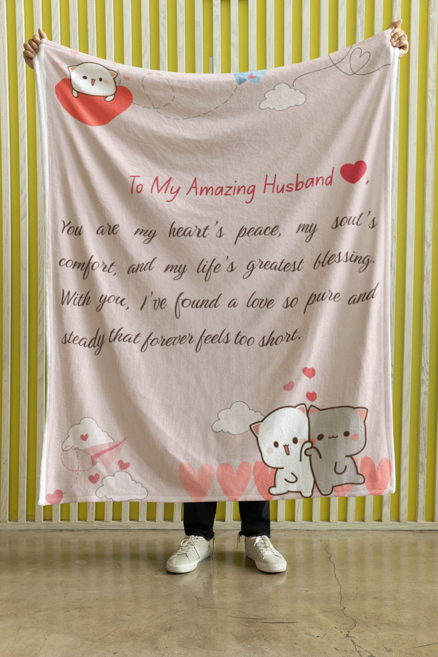 mockup-of-a-person-holding-a-velveteen-plush-fleece-blanket-against-a-yellow-wall-m35704